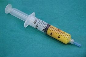 syringe with adipose tissue for penis enlargement surgery
